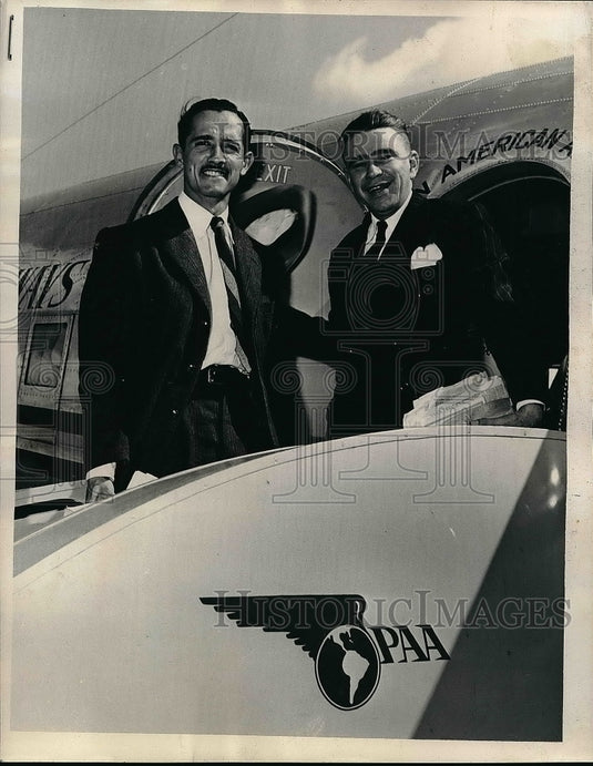 1945 Mariano Sans and Otilie White exiting plane  - Historic Images
