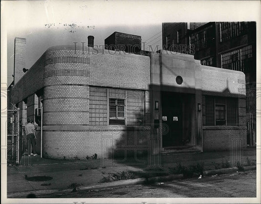 A Man At Other Entrance Of Building  - Historic Images