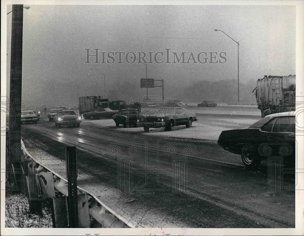 Press Photo Car Wreck on streets because of snow - Historic Images