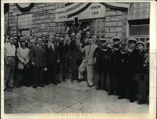1957 Thomas Haggerty greeted by union members  - Historic Images