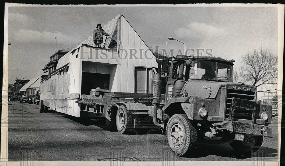 A Truck Transports A Building  - Historic Images