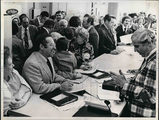 A room full of people, and one person to serve them all.  - Historic Images