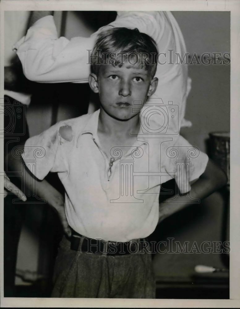 1938 Eugene Kuchnicki after being caught exploring a cave at 9 years - Historic Images