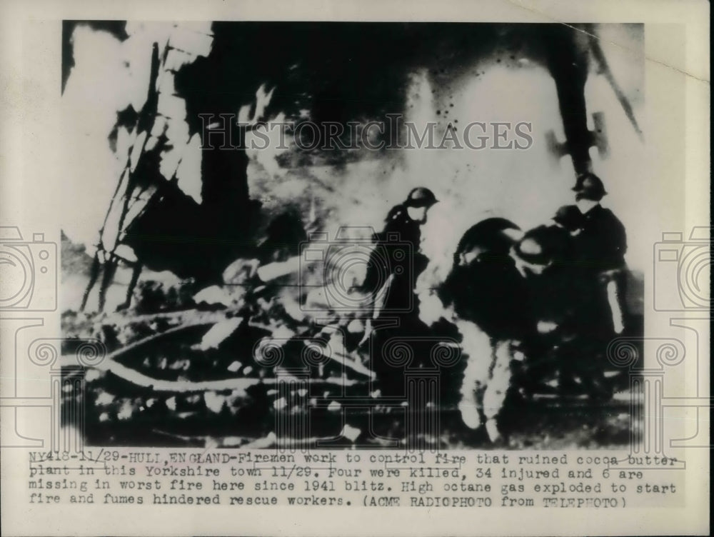 1948 Press Photo Firemen Work to Control Fire at Cocoa Butter Plant - nea58343 - Historic Images