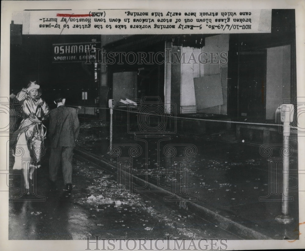 1949 The morning after a hurricane blew out glass out of windows. - Historic Images
