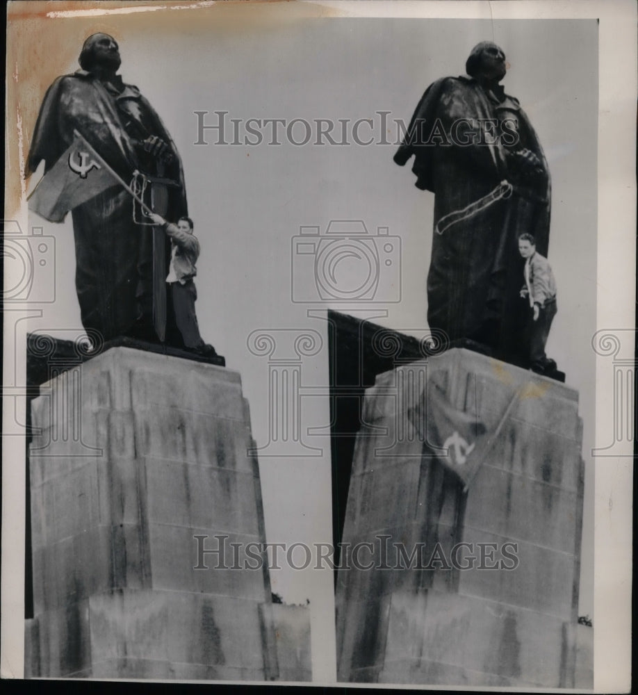 1950 J. H. Brown removes Soviet Flag from George Washington statue - Historic Images