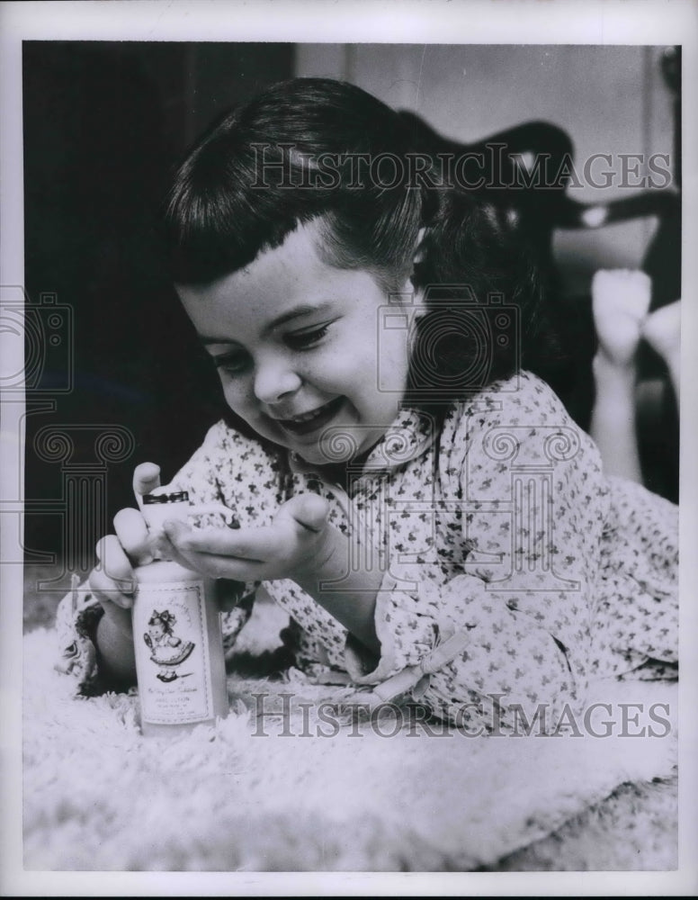 1955 Pink Hand lotion Junior dispenser bottle  - Historic Images