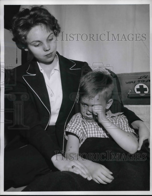 1960 Pat Ferron and Jack Metcalfe in a mock Red Cross disaster - Historic Images