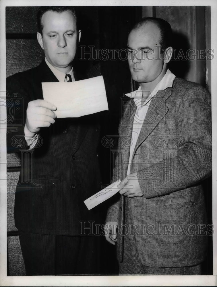 1944 Press Photo Glenn James &amp; John Livingston Reading Telegram - nea60169 - Historic Images