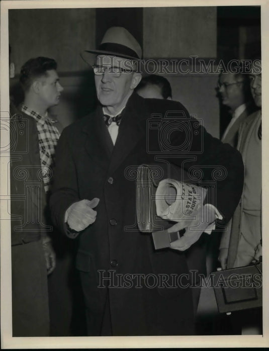 Judge Blyther Leaving Courthouse With Newspaper  - Historic Images