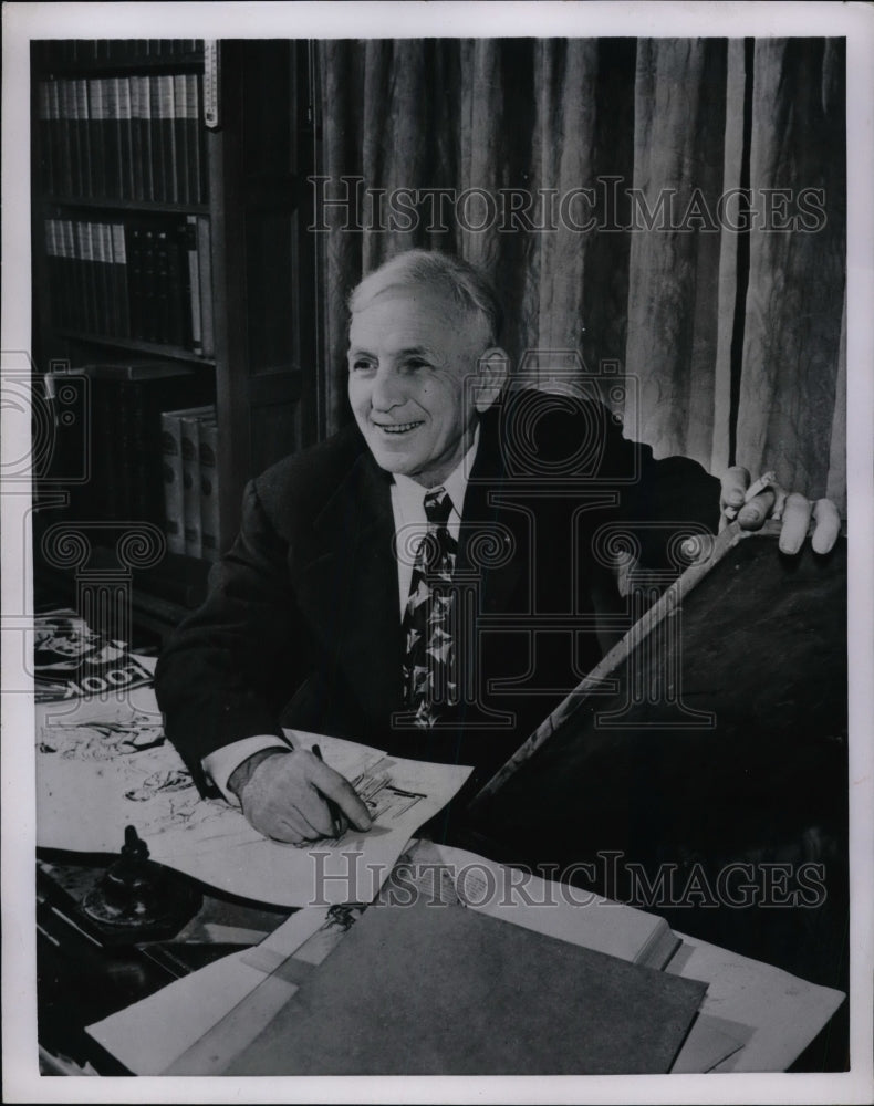 1952 J.B. Williams Artist at Desk  - Historic Images