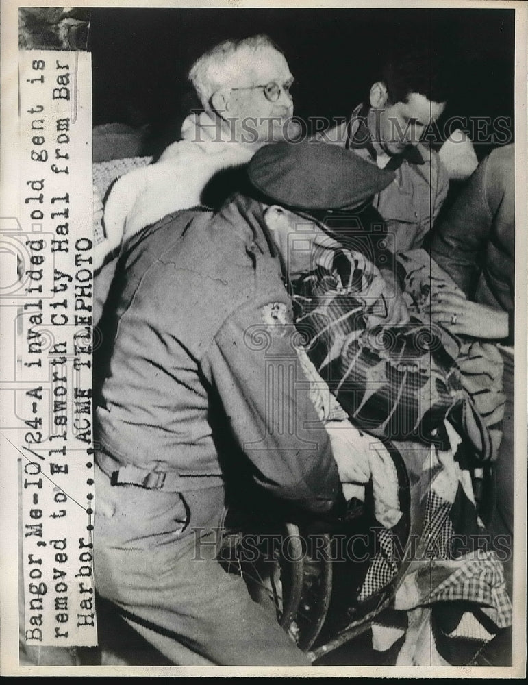 1947 elderly man is removed to Ellsworth City Hall from Bar Harbor - Historic Images