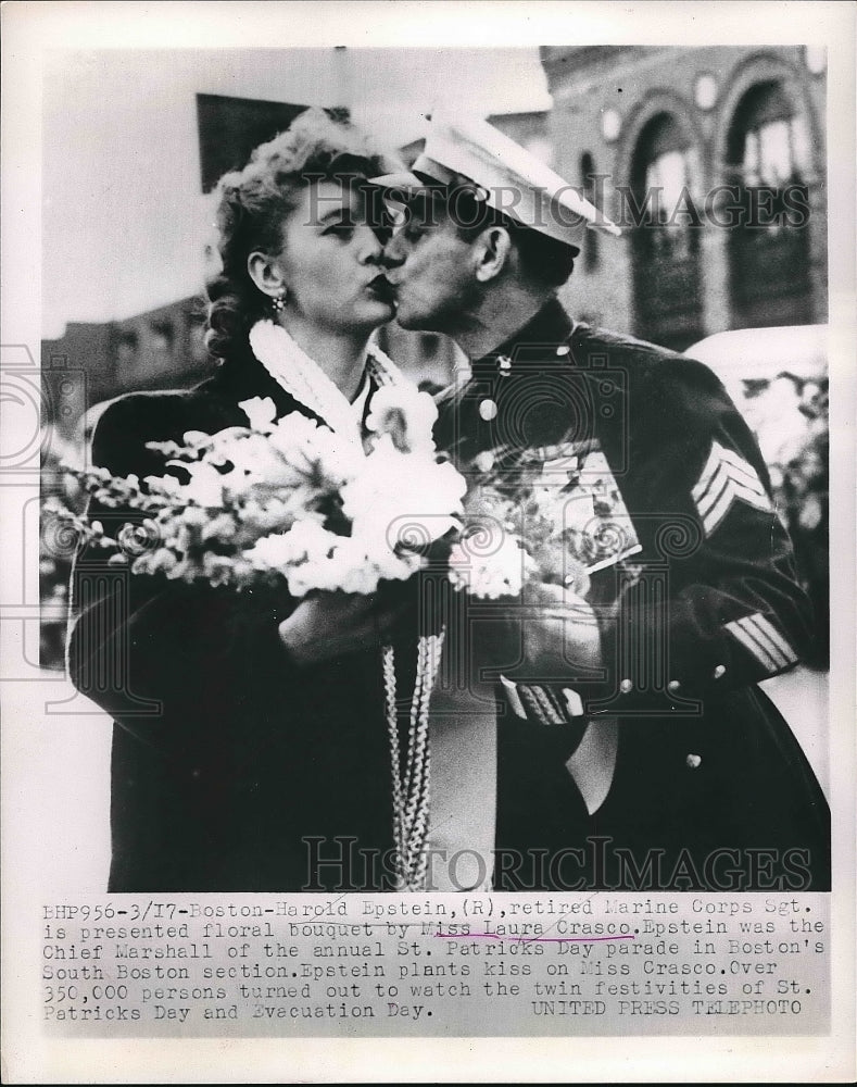 1953 Harold Epstein kissing Laura Crasco at St. Patrick's Parade - Historic Images