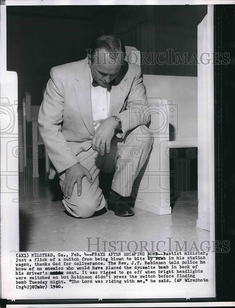 1960 thankful Rev. J. T. Robinson, unhurt from bomb in his car - Historic Images