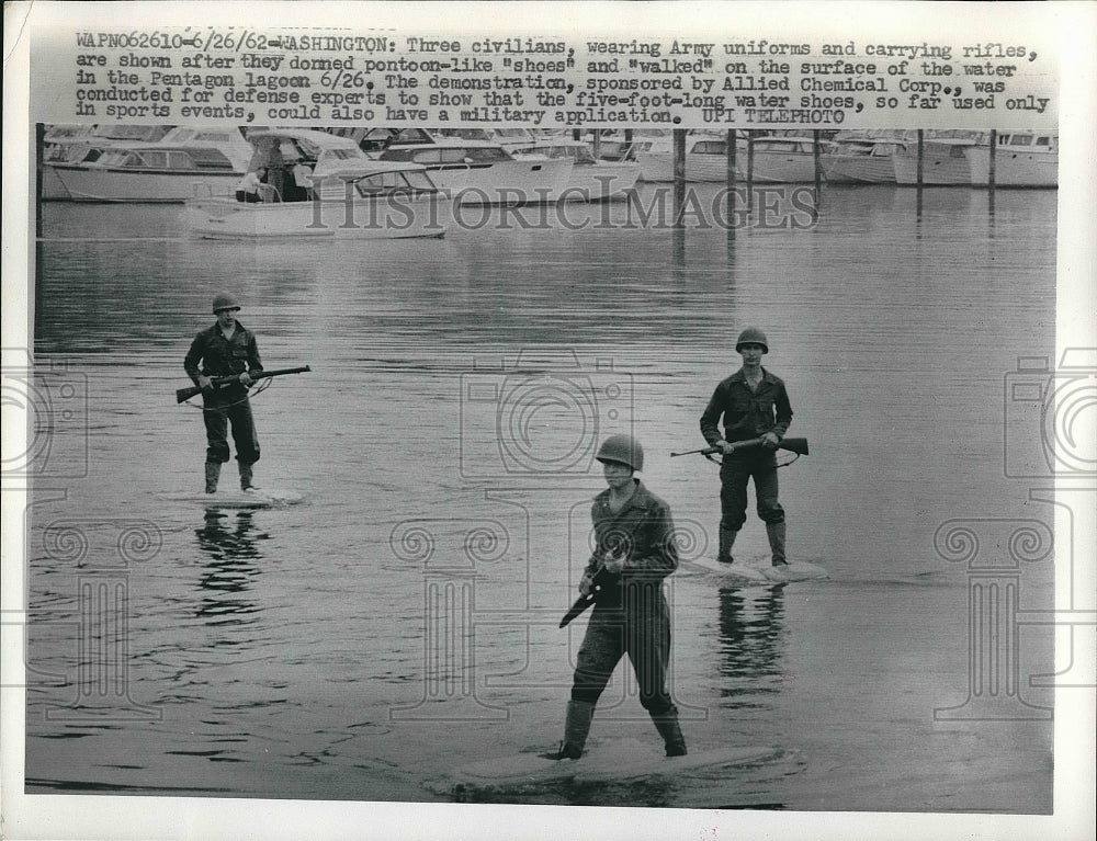 1962 Press Photo Civilians Wear Army Uniforms and &quot;Shoes&quot; for Allied Chemical - Historic Images