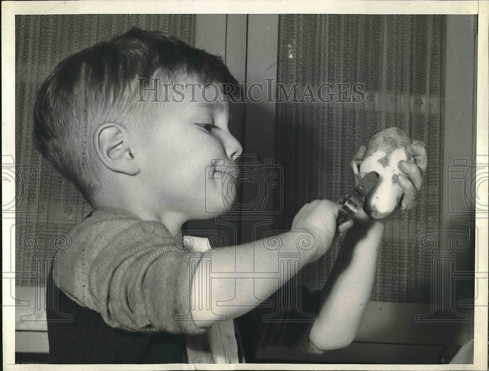 1943 Willard Hatch, Jr. Peels Potatoes for Dinner  - Historic Images