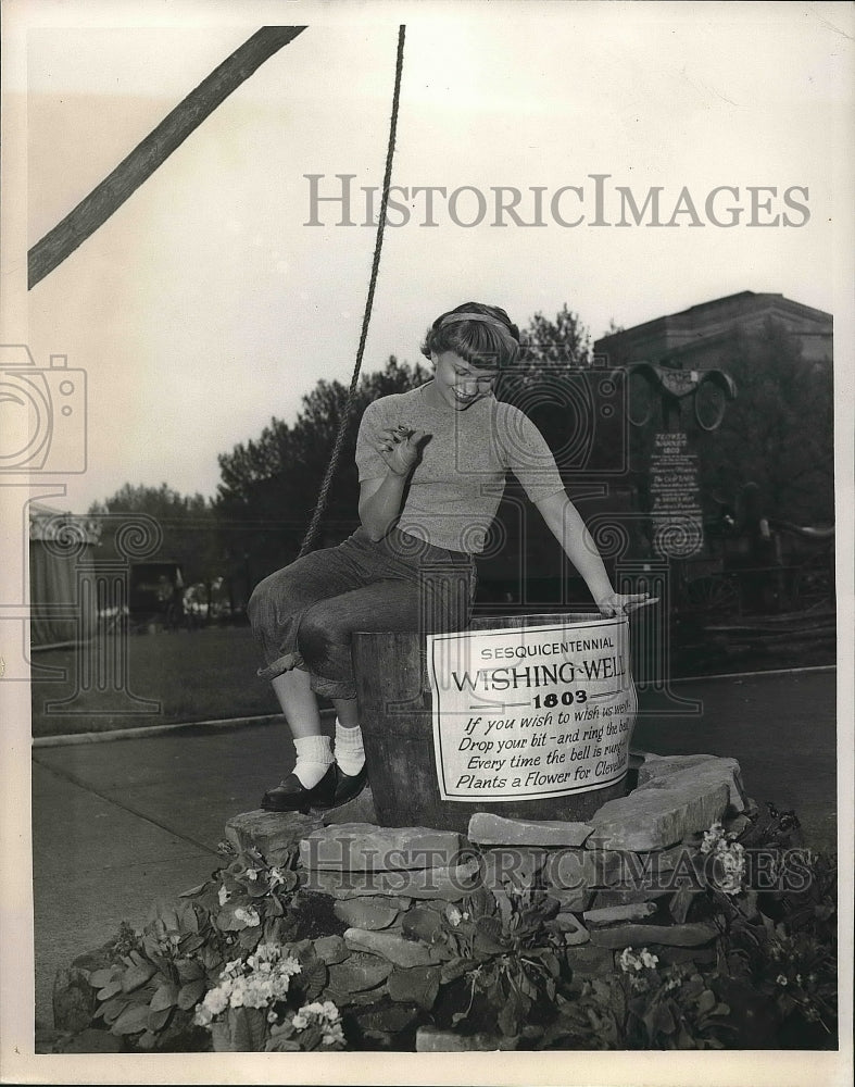 1953 Mrs. Lucille Chester Sitting By Wishing Well  - Historic Images