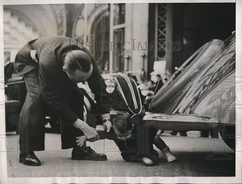1938 Man Pulls Mischevious Child Out From Under Car  - Historic Images