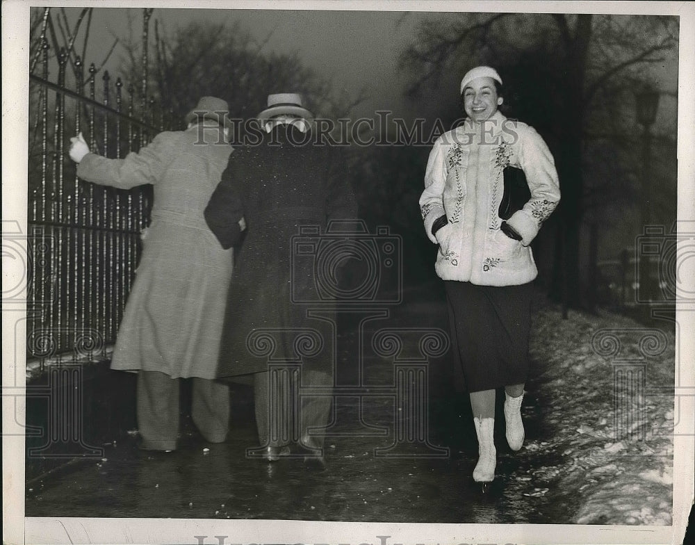 1937 Press Photo People walking down the road in winter - nea63287 - Historic Images