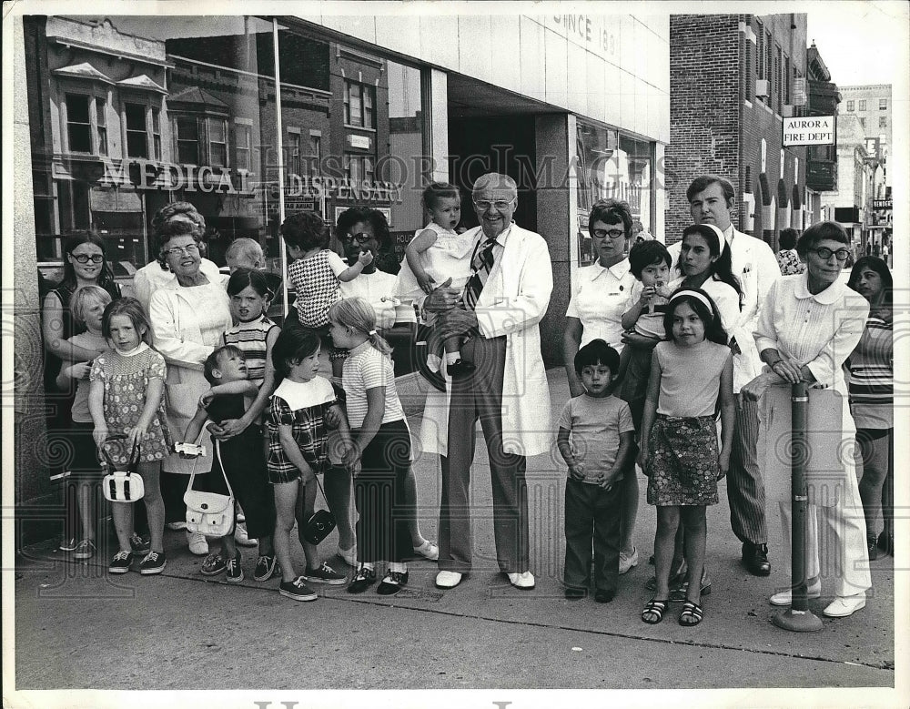 1973 Dr. Eugene R. Balthazar outside free medical dispensary - Historic Images