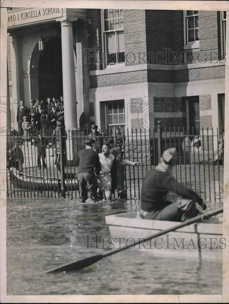 1936 Mr. Sam De Mamo walking through the water  - Historic Images