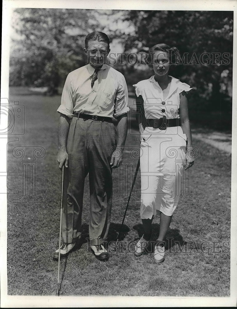 1935 Maurice Walsh and Mrs. Hettleman at golf tournament  - Historic Images