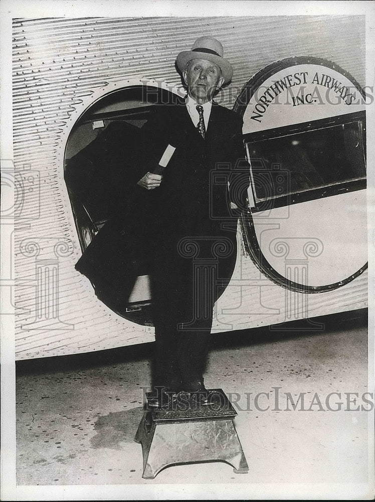 1934 Fred Walters exiting airplane  - Historic Images