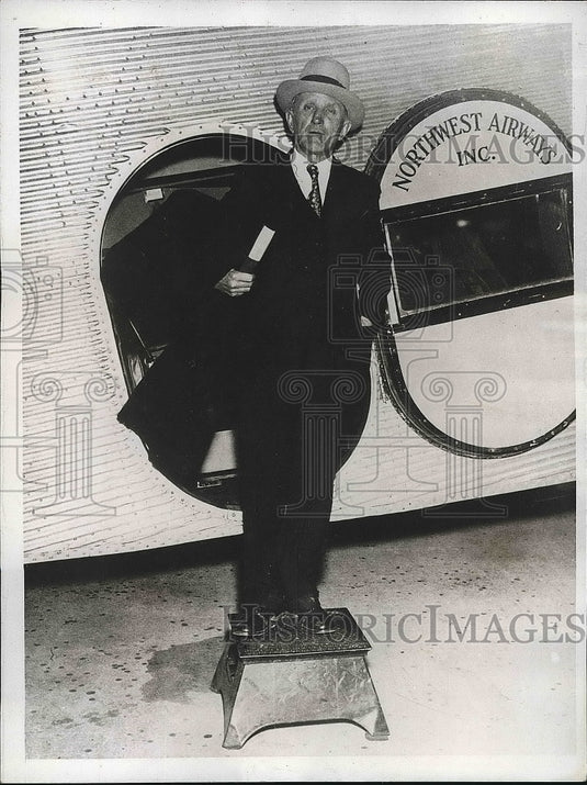 1934 Fred Walters exiting airplane  - Historic Images