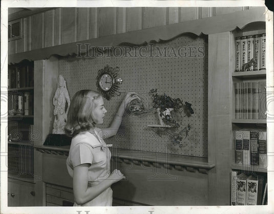 1958 Woman Waters Plants In Home  - Historic Images