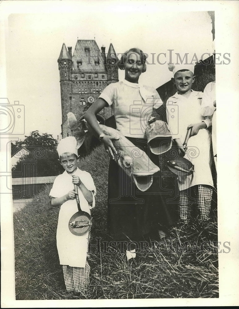 1933 Girl and Boys with Fish and Frying Pans at Flapper Festival - Historic Images