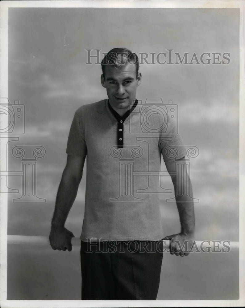 1960 Press Photo A young man in a knit sweater shirt - nea64870-Historic Images
