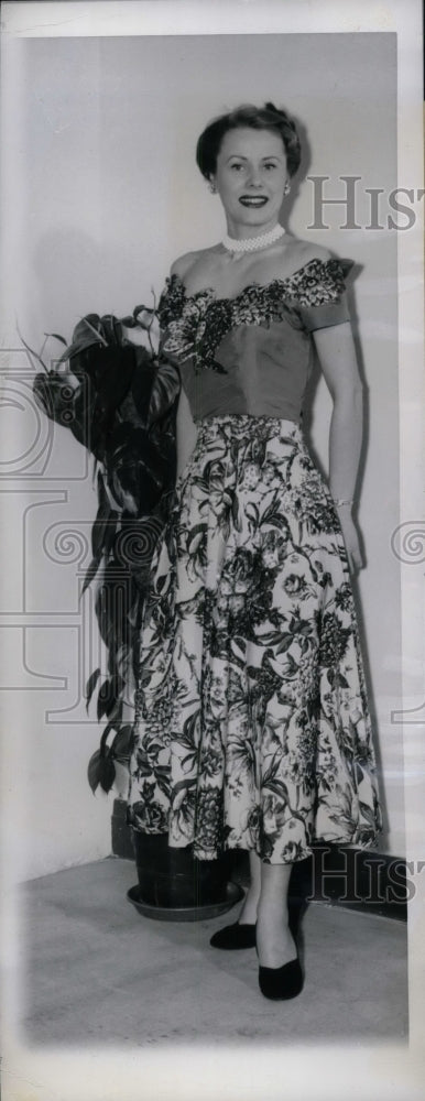 1950 Lady Modeling Cocktail Dress by Allardale  - Historic Images