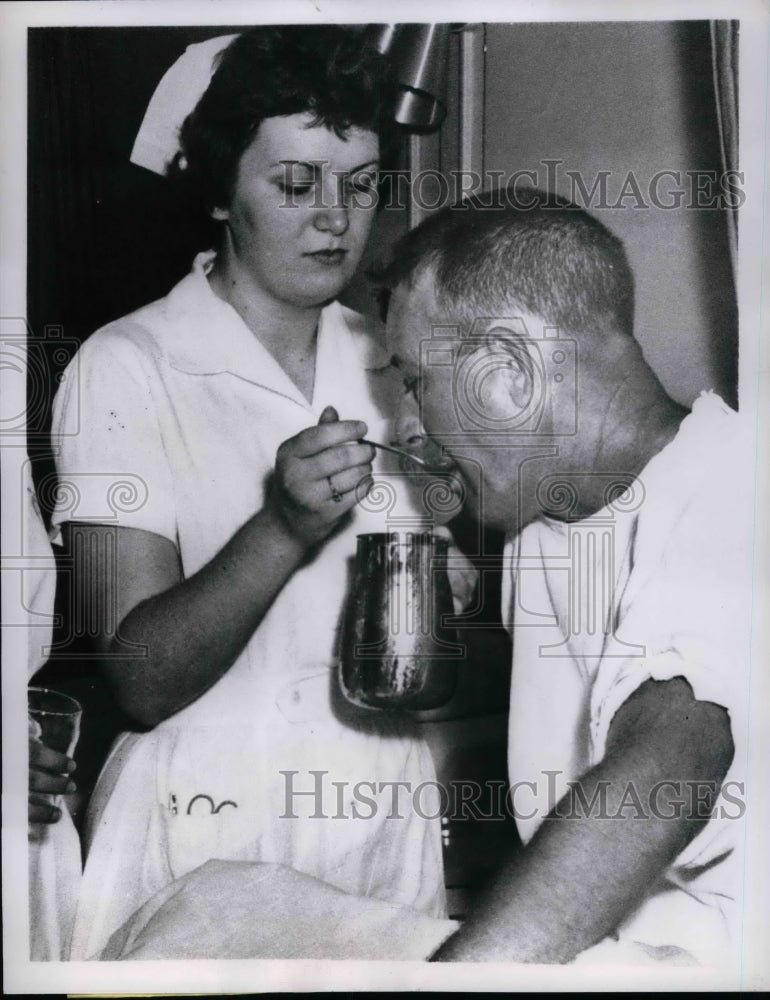 1959 Food poison victim Clarence Johnson &amp; nurse R Clawson in Ind. - Historic Images