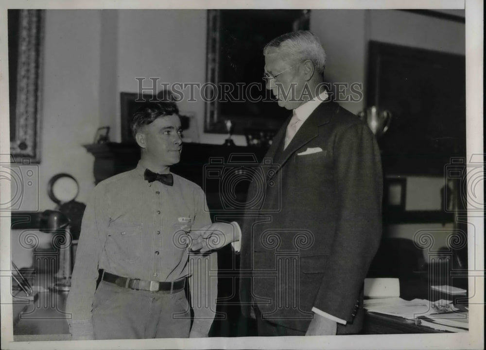 1935 Thomas A. Hannaberry Rescues Pigeon, George M. Woolsey - Historic Images