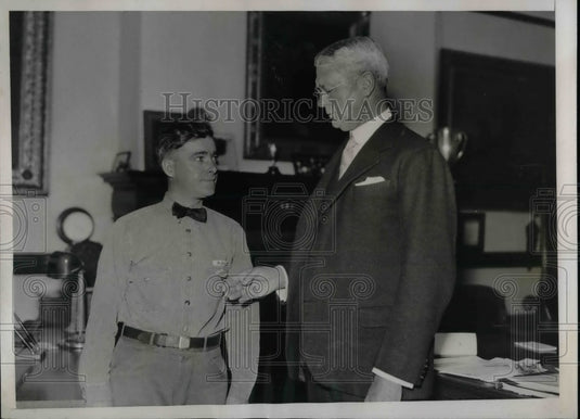 1935 Thomas A. Hannaberry Rescues Pigeon, George M. Woolsey - Historic Images