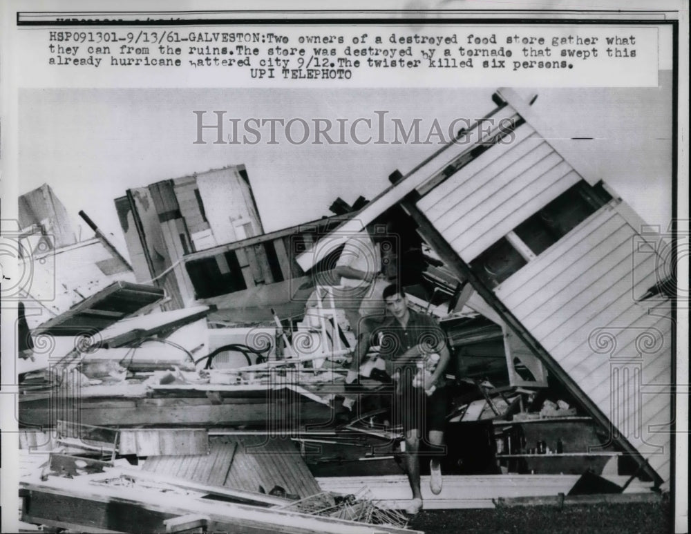 1961 store owners salvage items after tornado, Galveston, TX - Historic Images