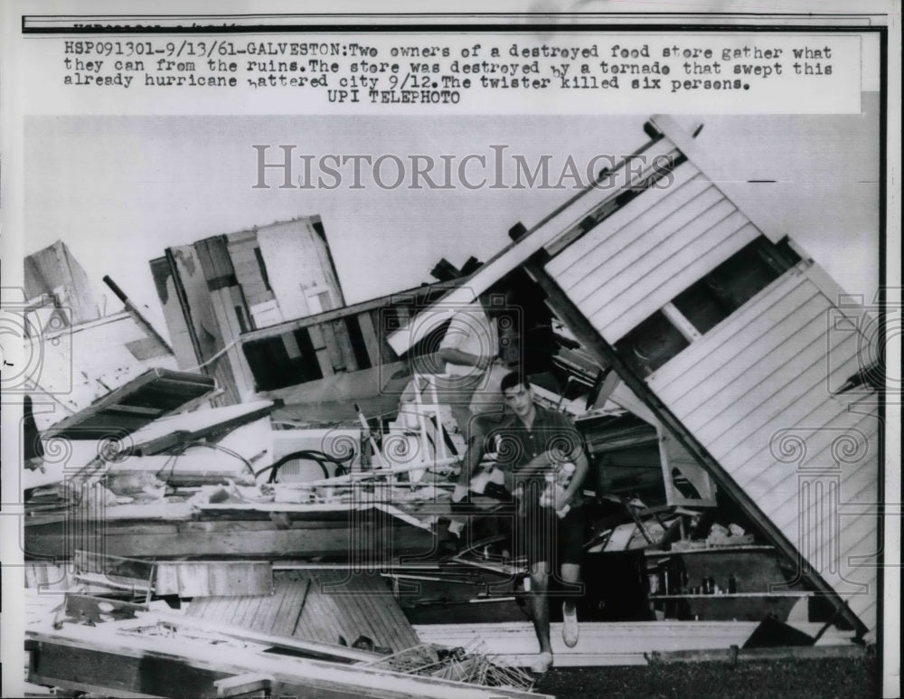 1961 store owners salvage items after tornado, Galveston, TX - Historic Images