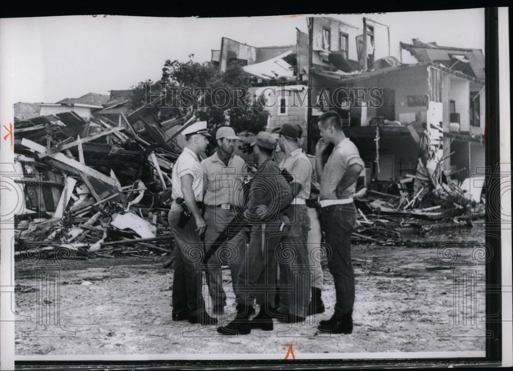 1961 police. nat'l guard patrol Galveston, TX after tornado - Historic Images