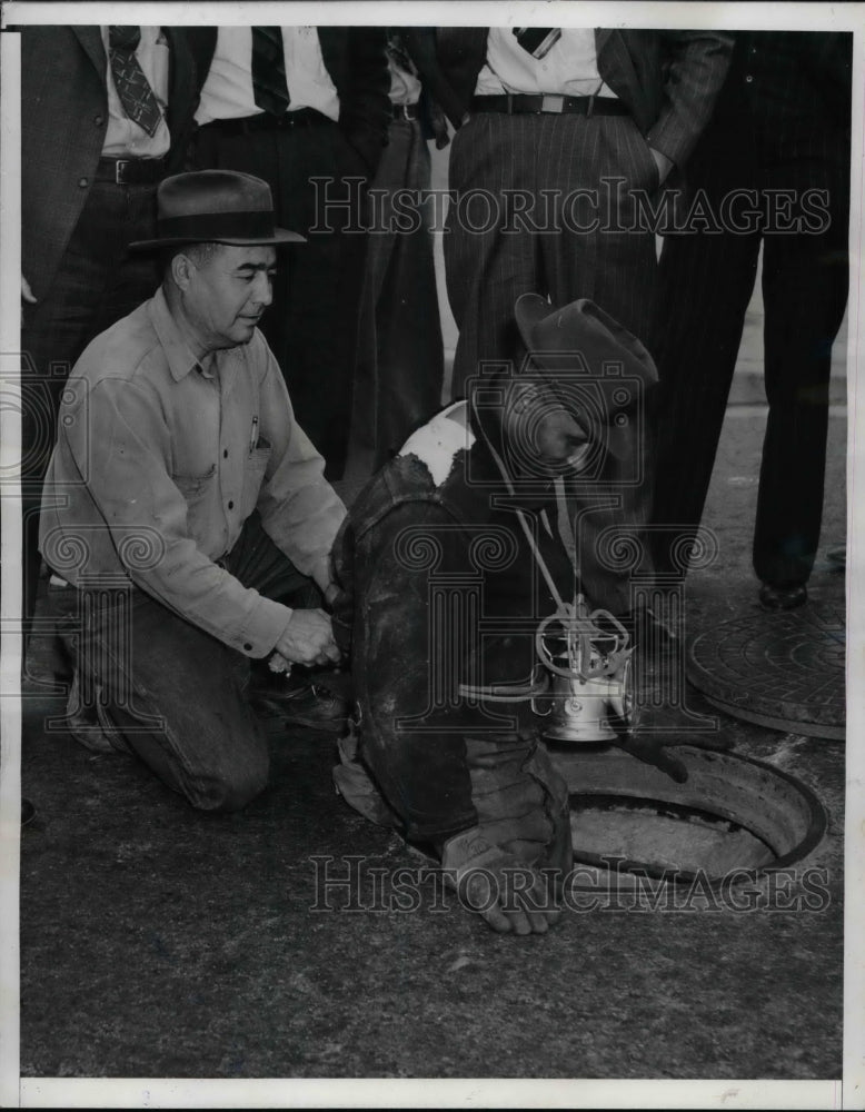 1940 Press Photo Workman W.N. Jones Storm drain - nea65662 - Historic Images