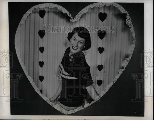 1949 Coreen Janps with chest expander striped sweater  - Historic Images