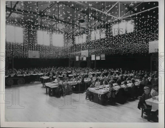1939 Dowagiak, Michigan, Hot lunch program in gym  - Historic Images