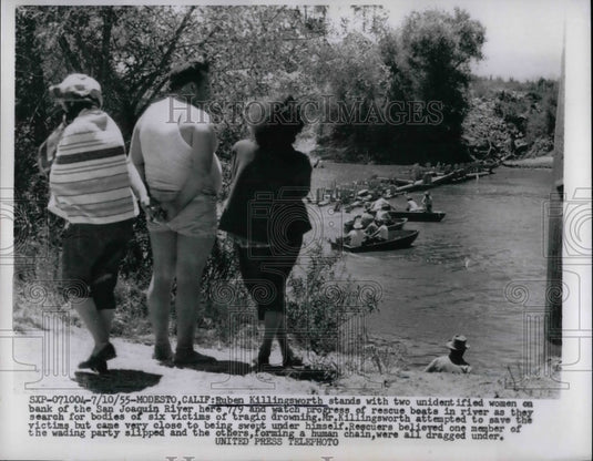 1955 Press Photo Ruben Killingsworth searching for rescue victims - nea66332-Historic Images