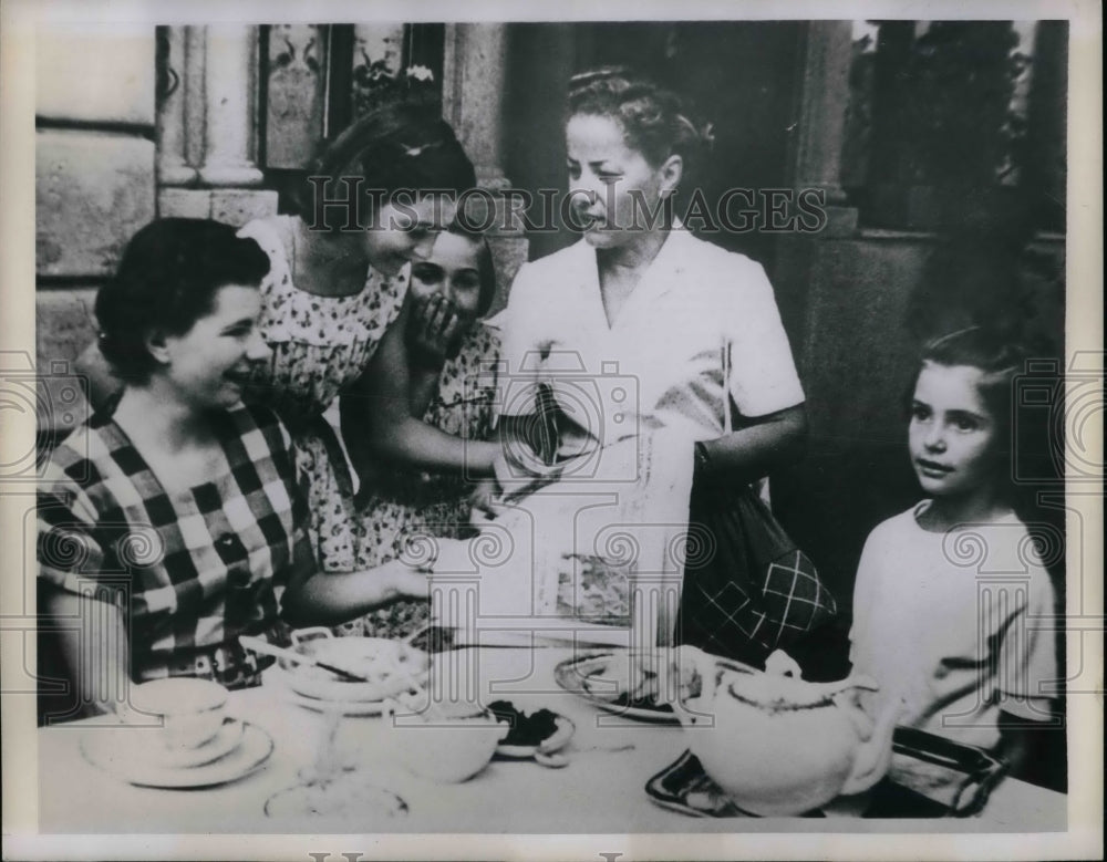 1960 Women family members eating together  - Historic Images