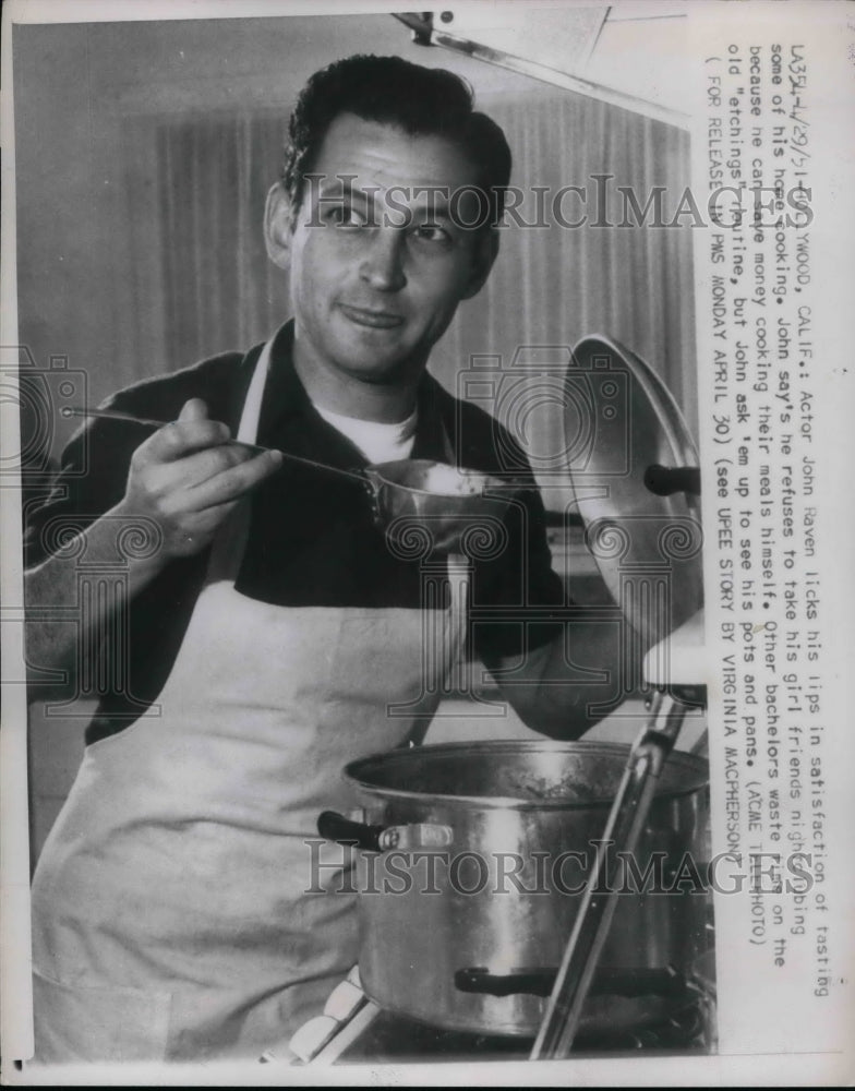 1951 Actor John Raven tasted some of his home cooking.  - Historic Images