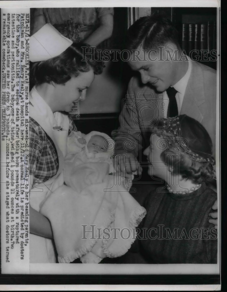 1954 Mr &amp; Mrs Henry Healy &amp; nurse with baby Mary Healy in NY - Historic Images