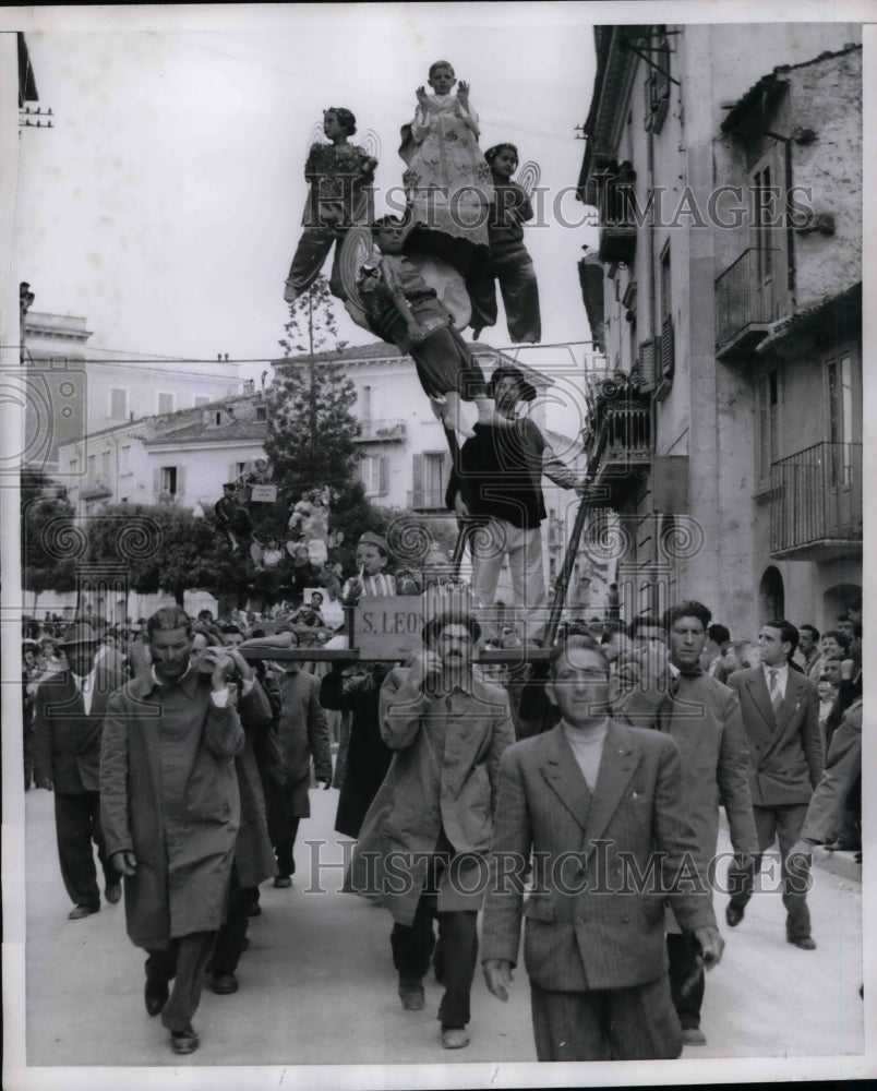 1954 Corpus Christi procession with St leonard &amp; angels  - Historic Images