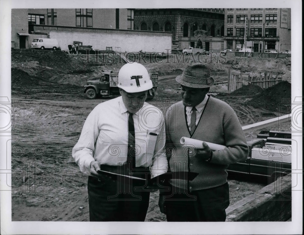 1967 Lynn Robinson & J. C. Jones at site of Central National Bank - Historic Images