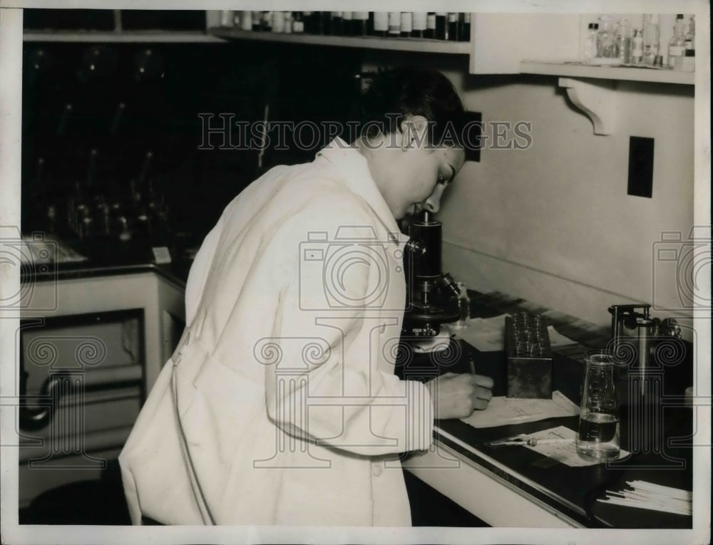 1938 Jean Kidwell at a medical clinic laboratory  - Historic Images