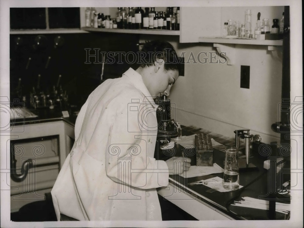 1937 Jean Kidwell at medical clinic laboratory  - Historic Images