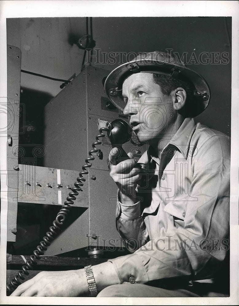 1955 gen Superintendent George Bauer at Texas Tower in a hurricane - Historic Images
